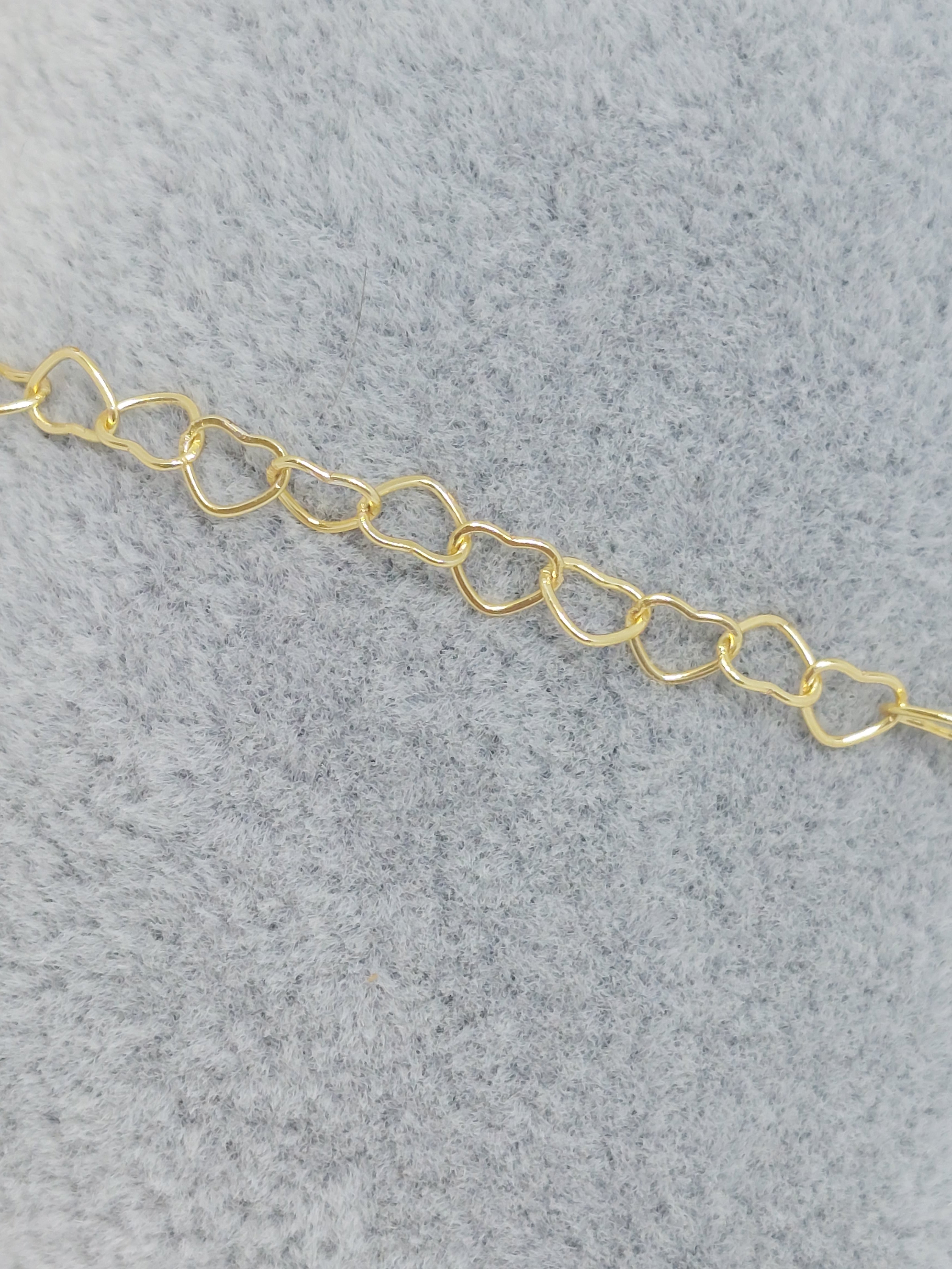 Armband hartjes goudkleurig (RVS)