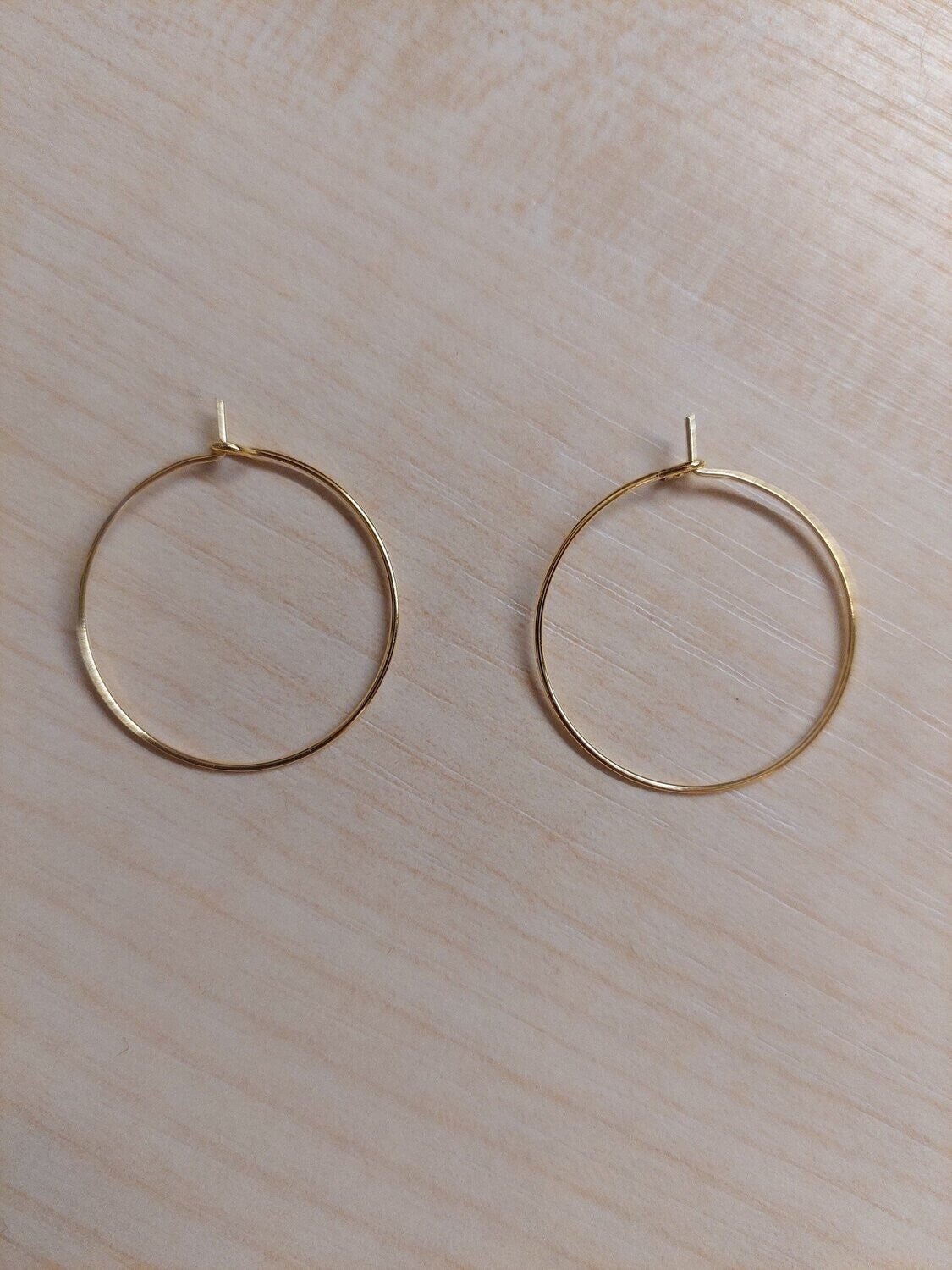 Oorbel rond 24mm goud