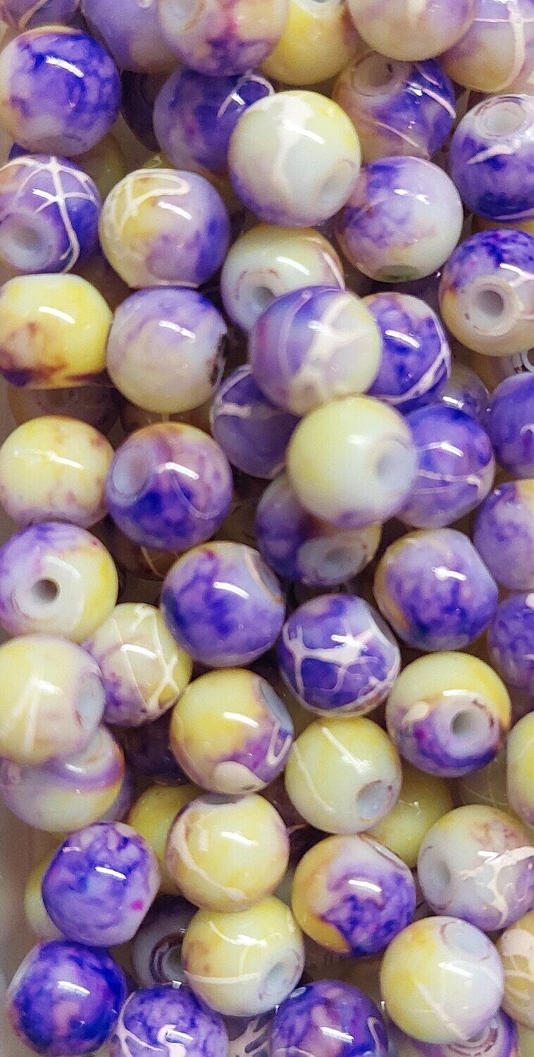 Glas kraal 6mm Paars/geel