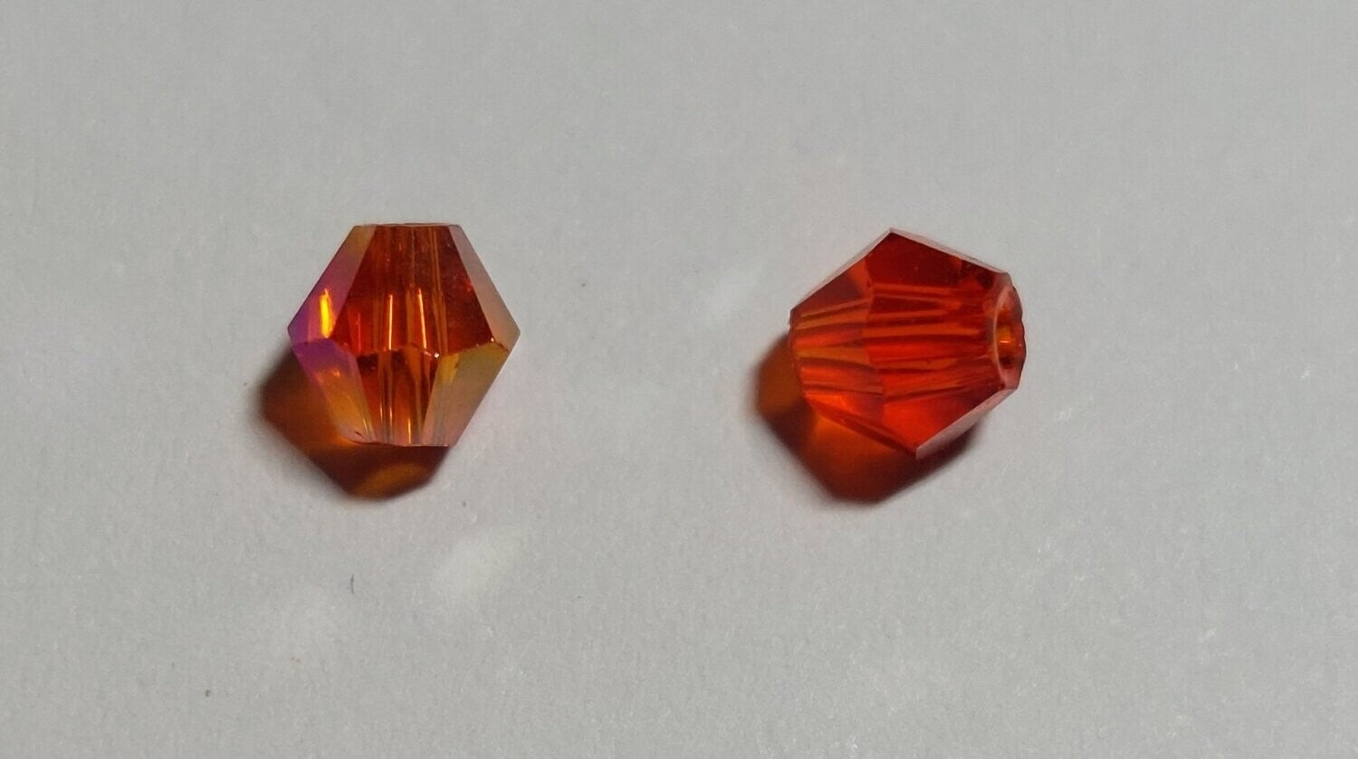 Bicone oranje/rood 4mm