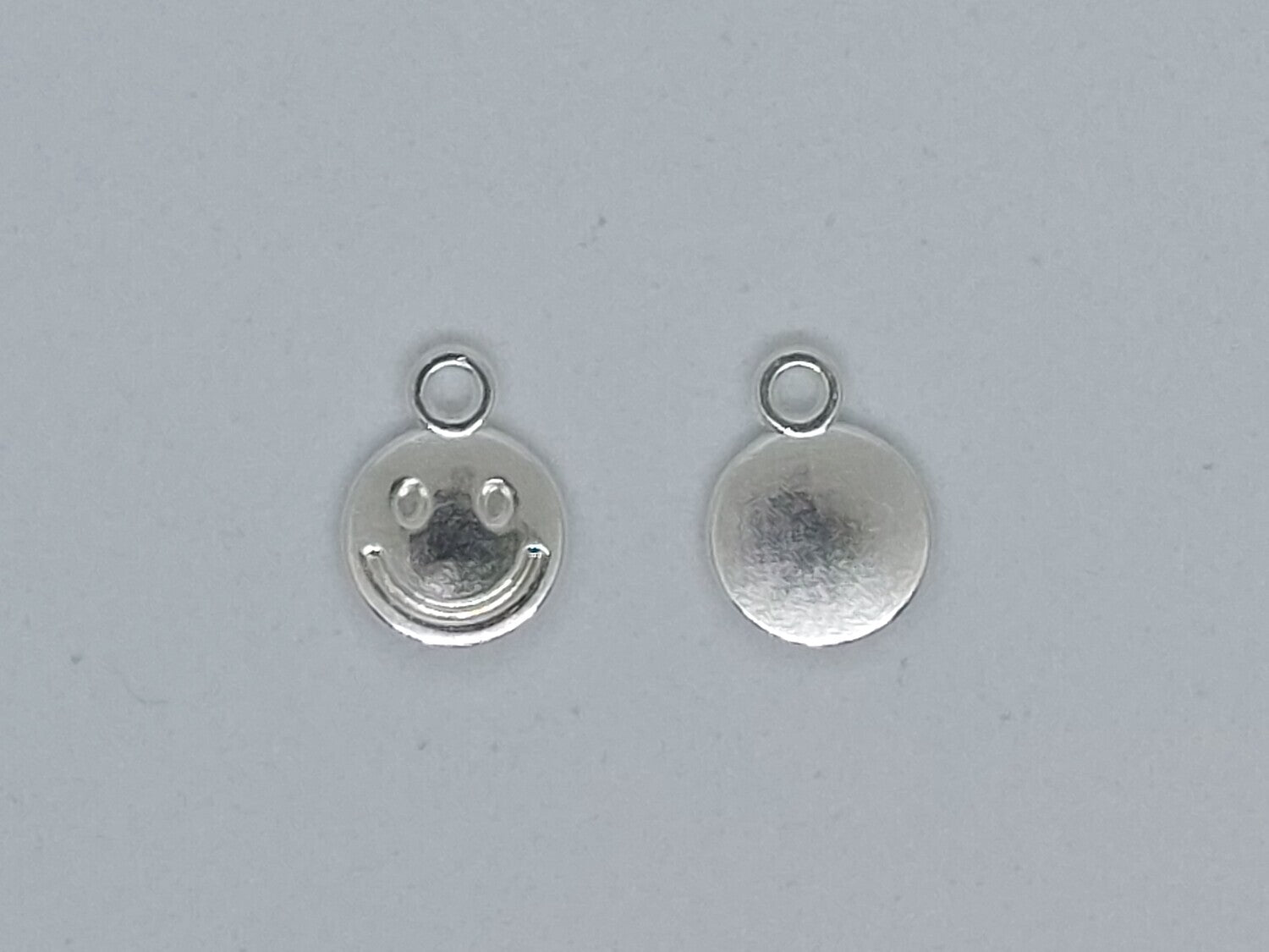 Bedel smiley zilver