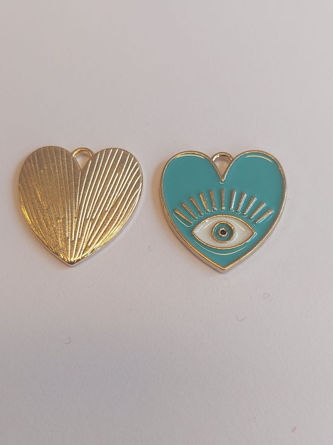 Bedel hart met boos oog turquoise