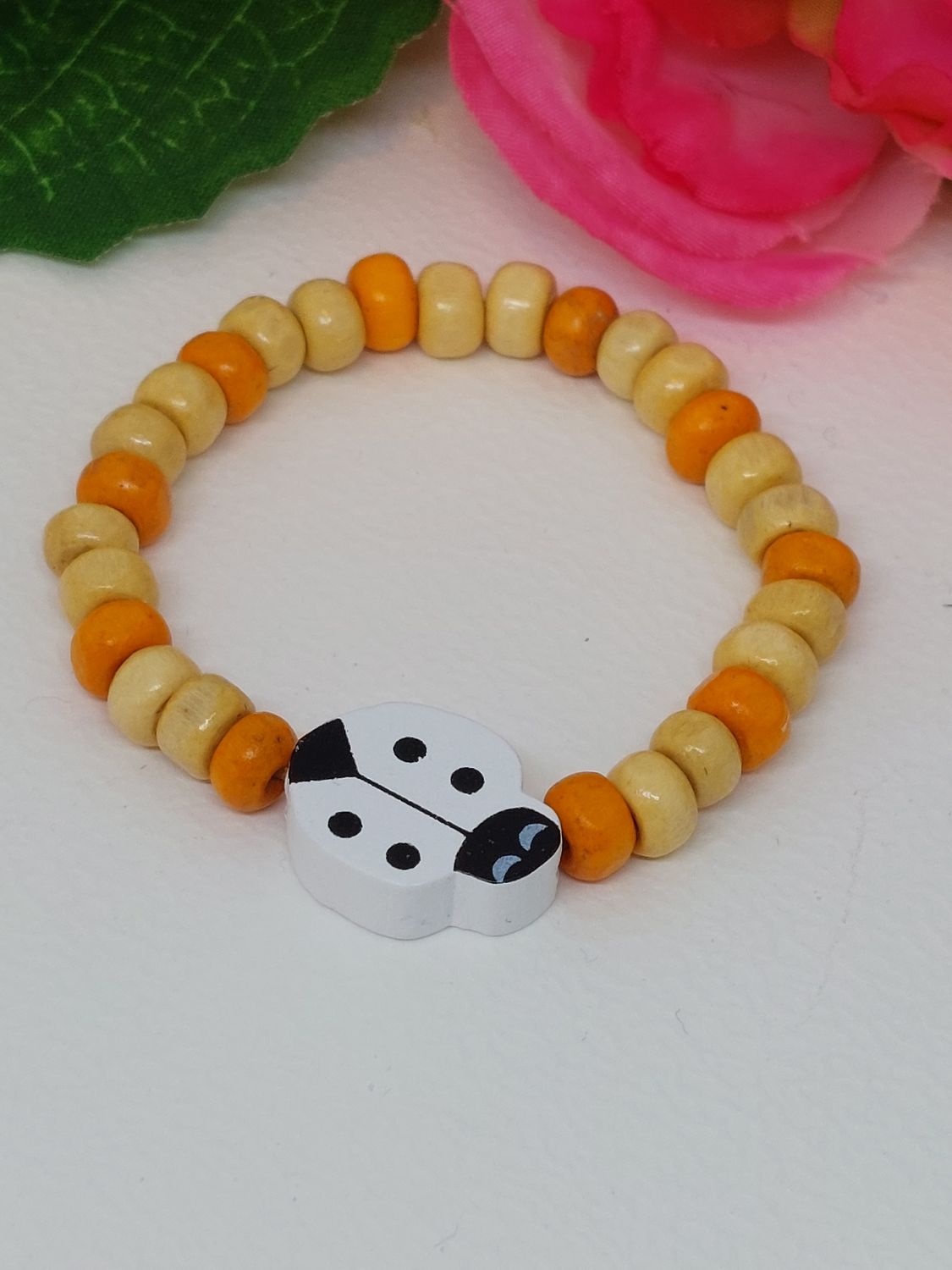Lieveheersbeestje wit met oranje