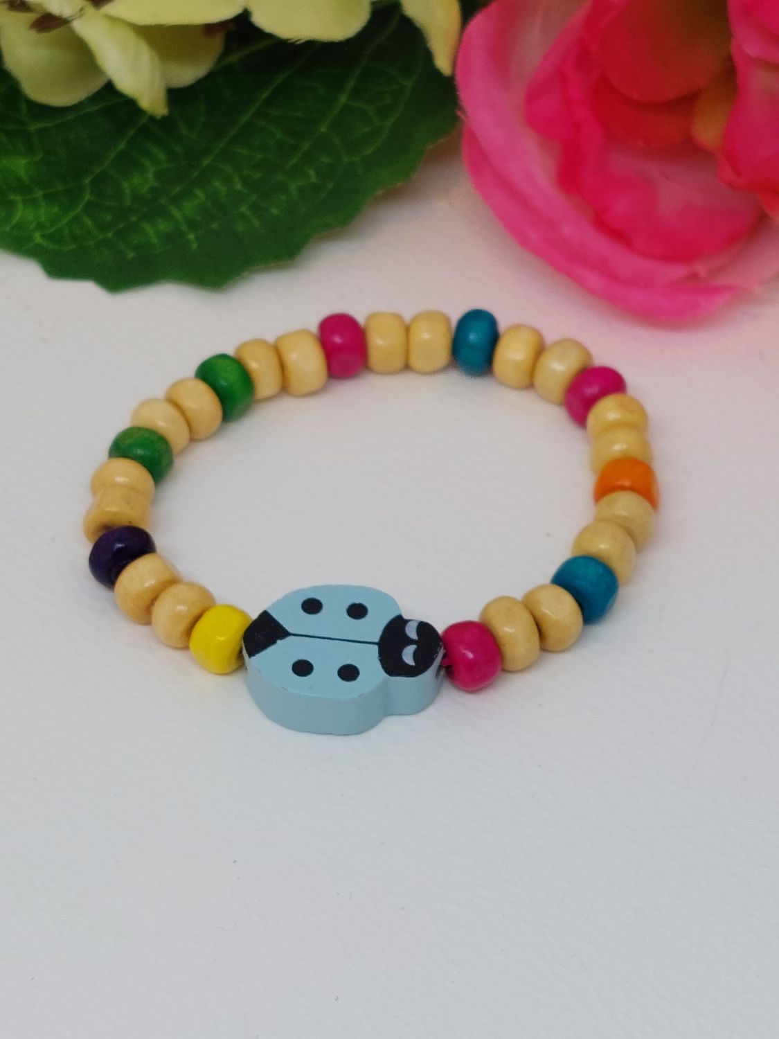 Lieveheersbeestje licht blauw met multicolor