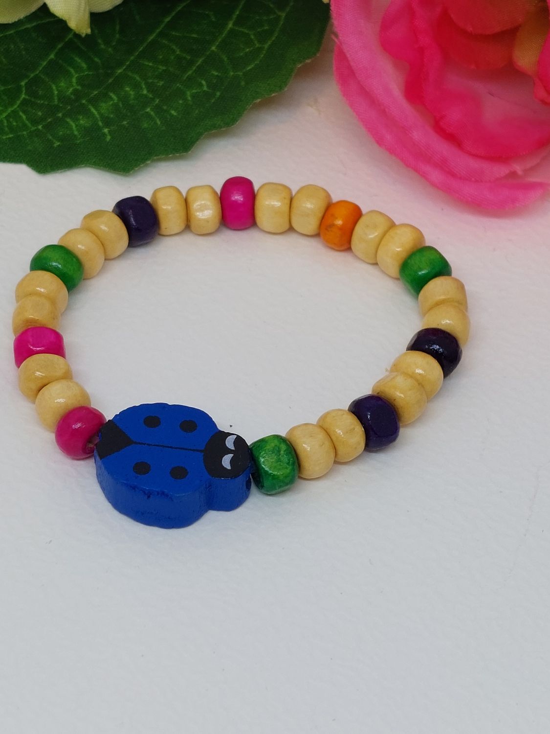 Lieveheersbeestje donker blauw met multicolor