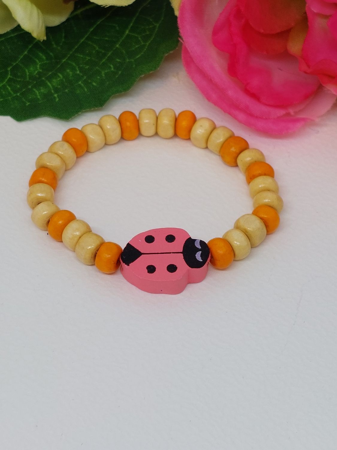 Lieveheersbeestje donker roze met oranje