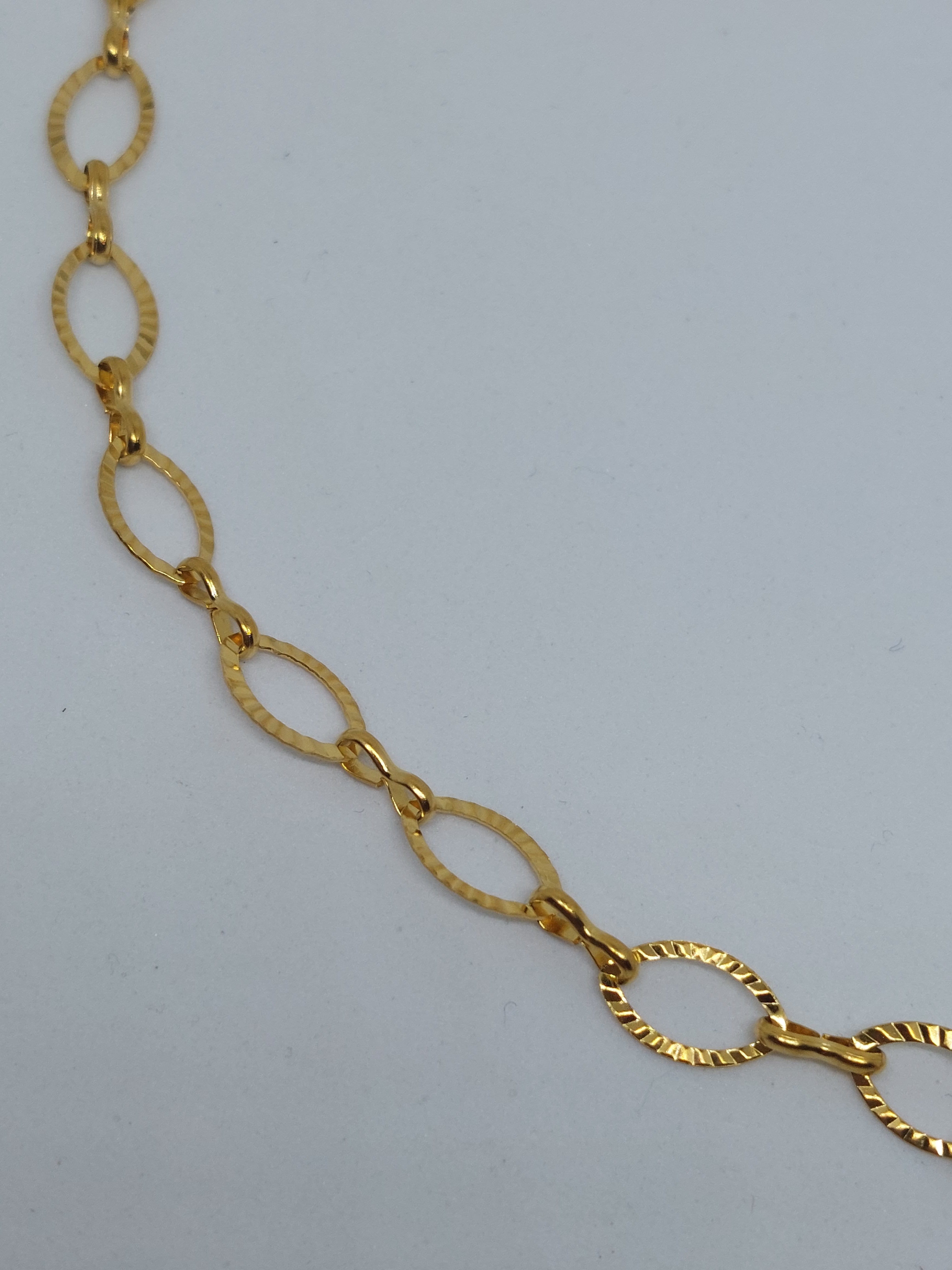 Schakelketting ovaal goudkleurig (RVS)