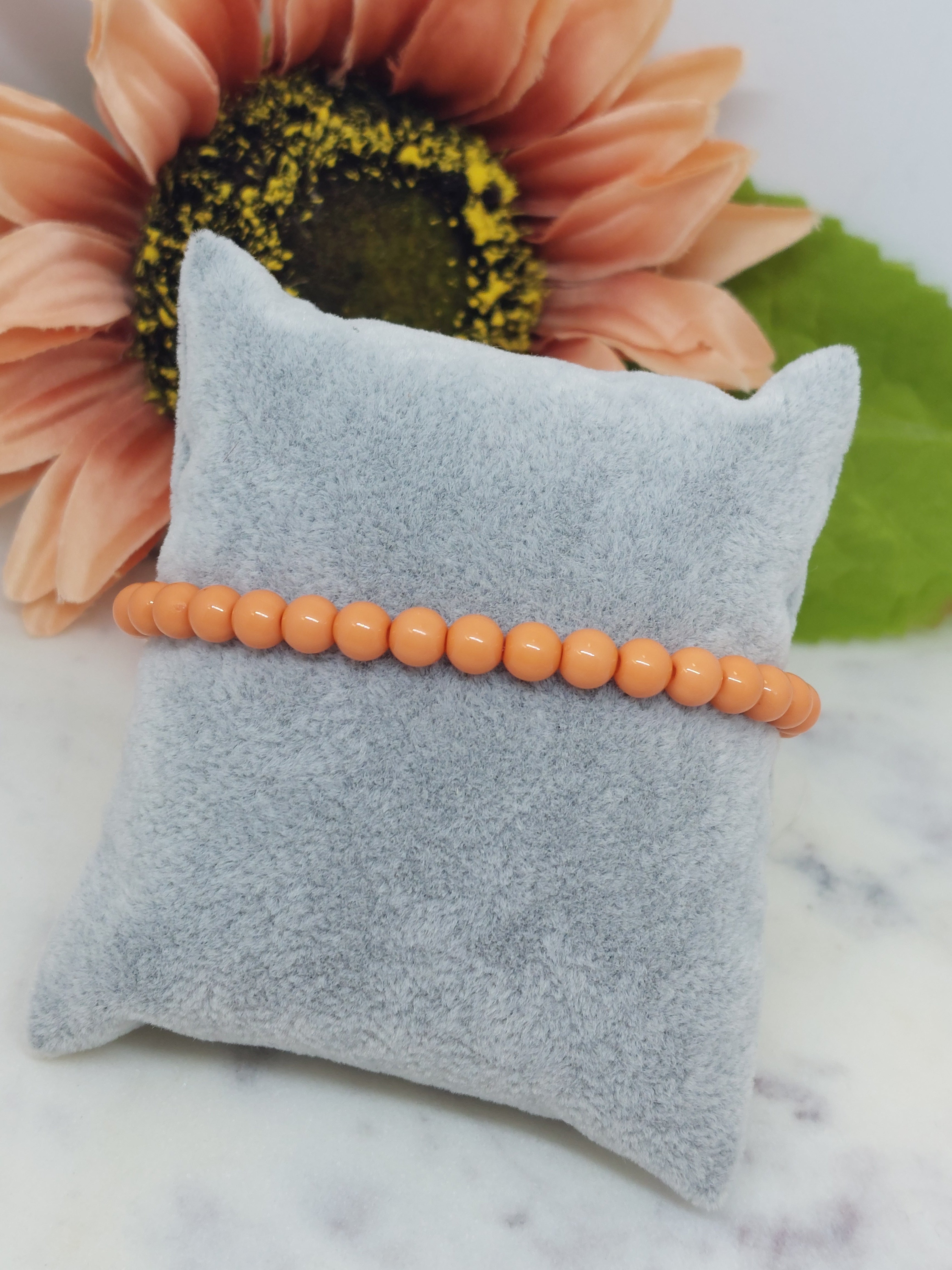 Kralen armband oranje/peach (6mm)