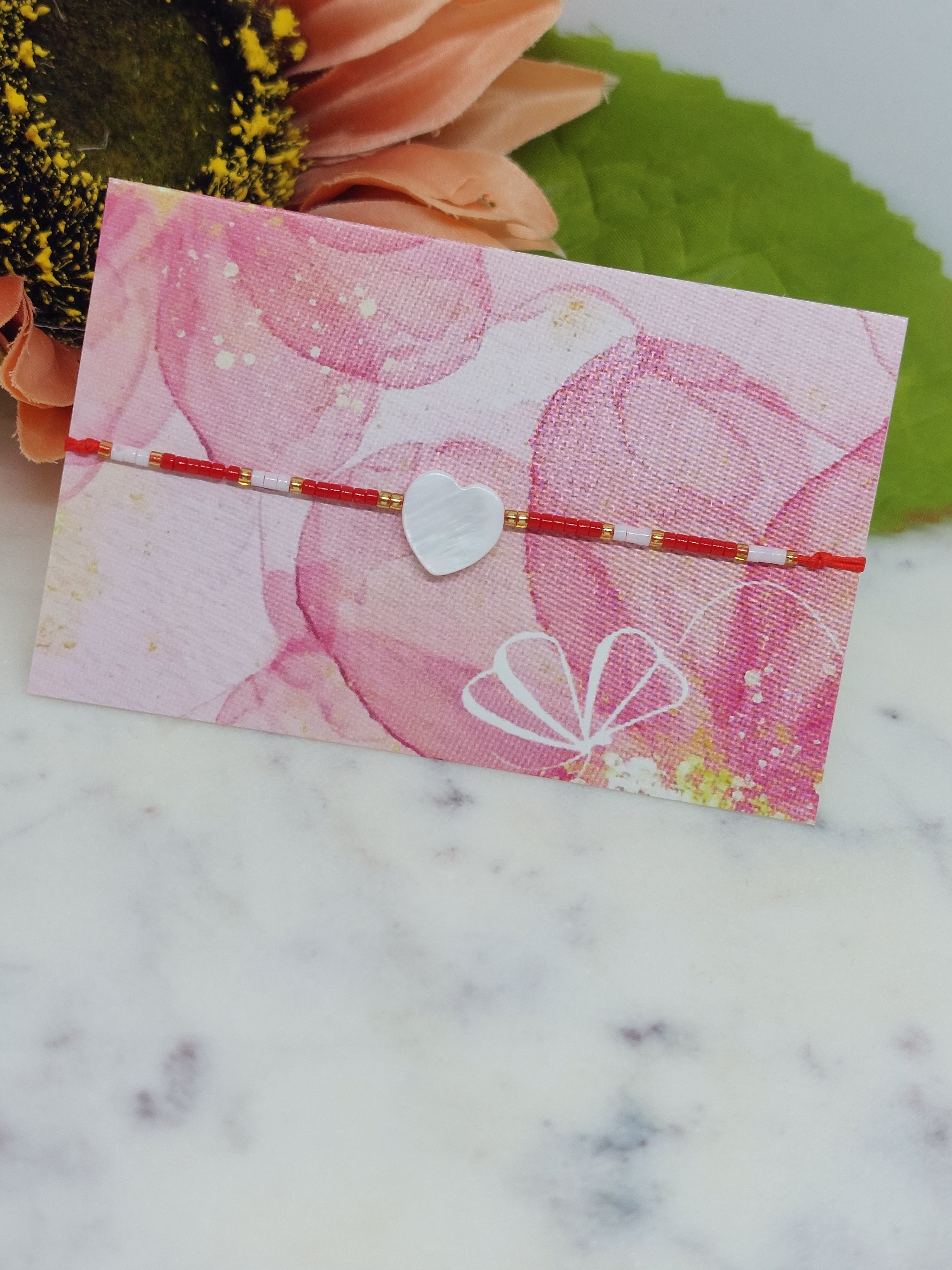 Armbandje hartje rood/wit