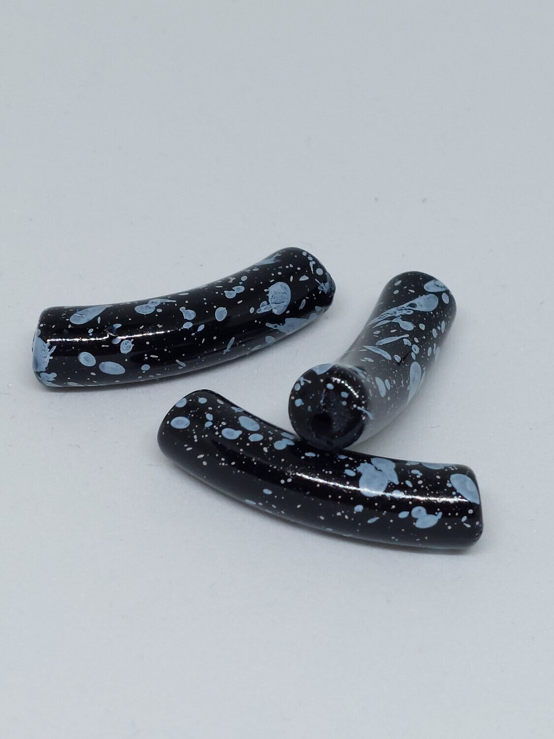 Tube kraal Verfspetter zwart/wit