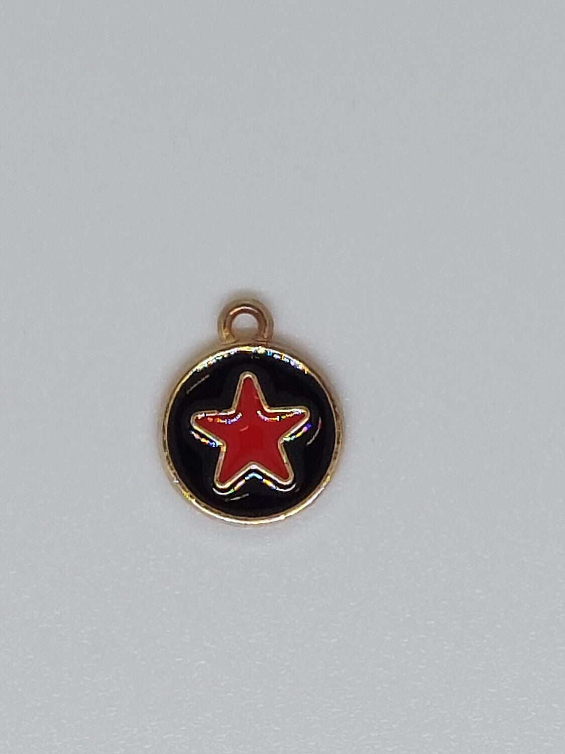 Bedel rond/ster zwart/rood