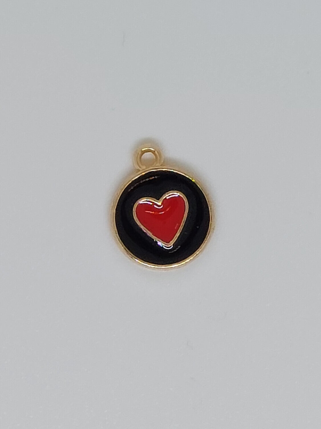 Bedel rond/hartje zwart/rood