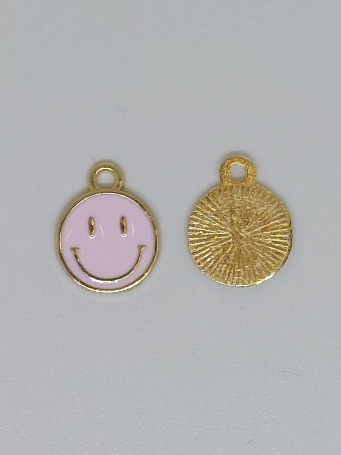 Bedel smiley licht roze